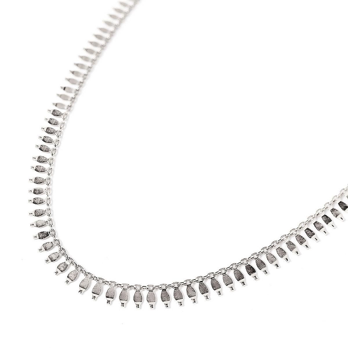 Sterling silver fringe chain necklace with small dangling teardrop links, on a white background