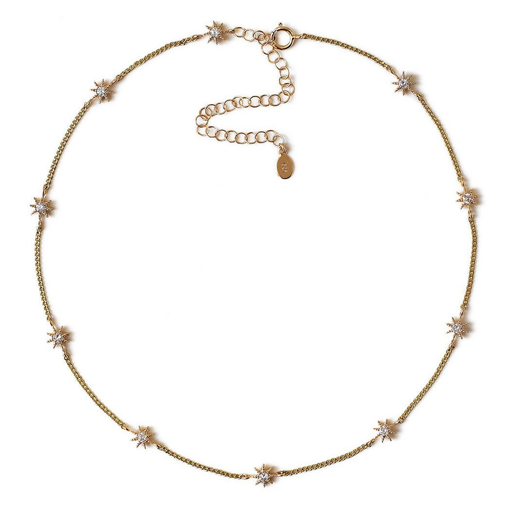 Gold vermeil starburst choker with white zirconia stations and a spring-ring clasp, on a white background