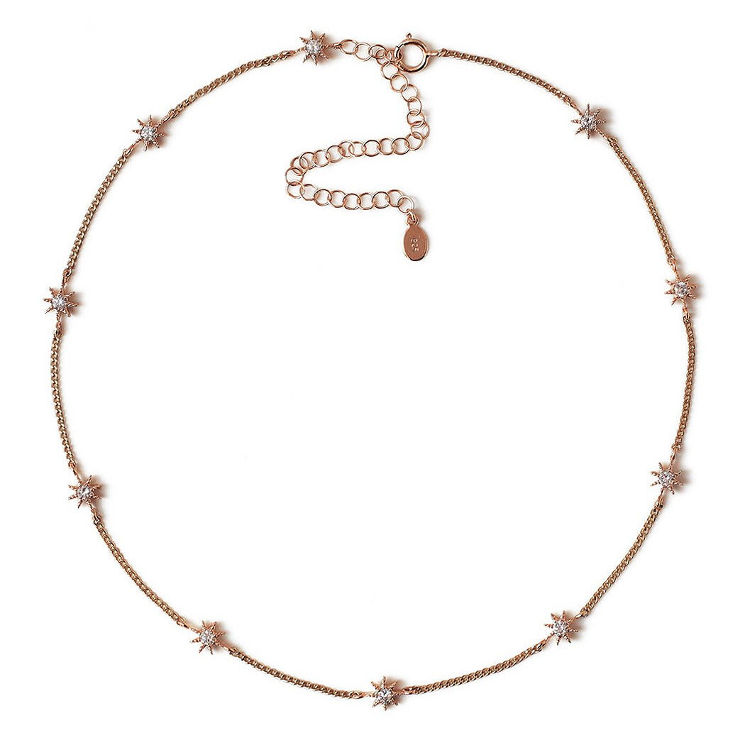 Rose gold vermeil starburst choker with white zirconia stations and a spring-ring clasp, on a white background
