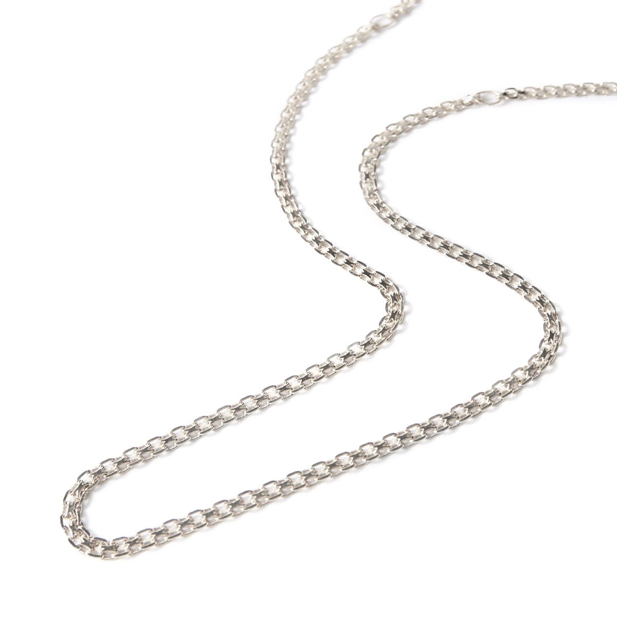 Sterling silver Bismark mesh chain choker laid in an S-curve on a white background