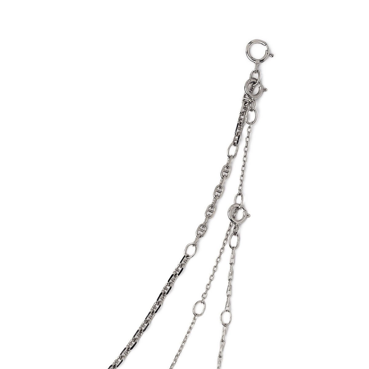 Sterling silver Marina disc layered trio, close-up of spring-ring clasps and chain links on a white background