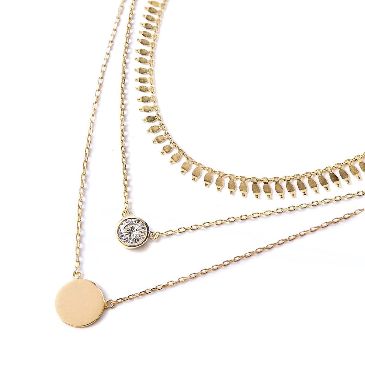 Gold vermeil fringe choker with bezel clear stone and disc coin pendant layers, on a white background