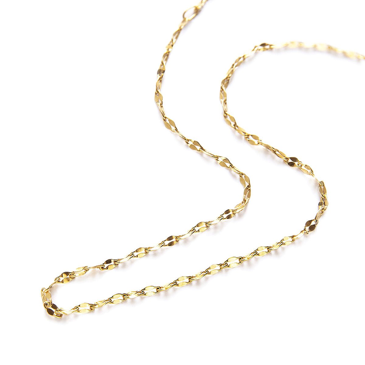 Gold vermeil textured lariat chain, laid in a curve on a white background