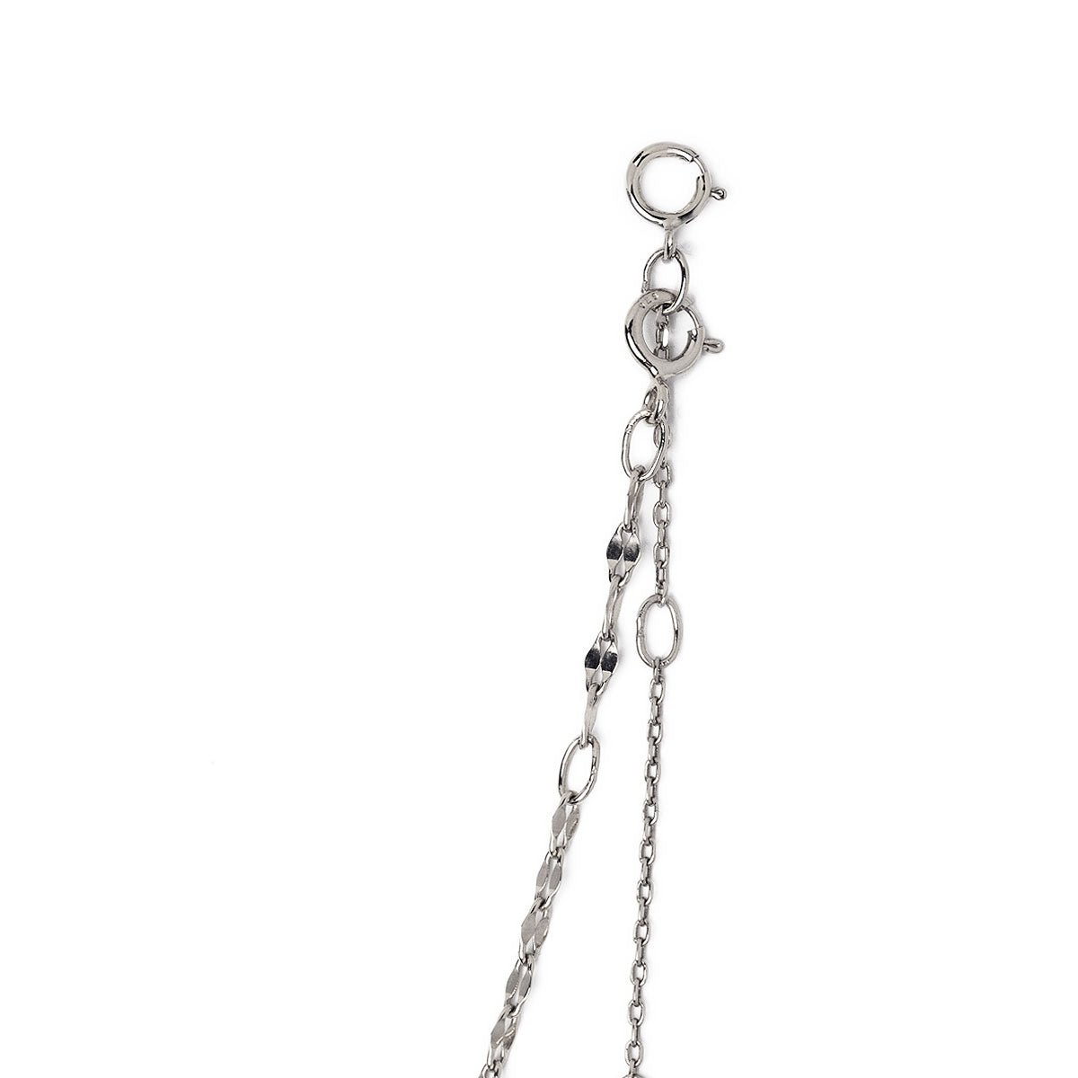 Sterling silver layered lariat duo with two spring-ring clasps, close-up of the chain detail on a white background