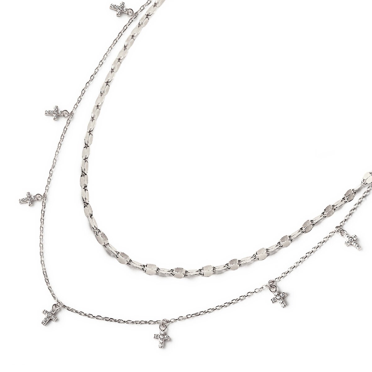Sterling silver layered duo with a mirror-link chain and a chain of zirconia cross charms, on a white background