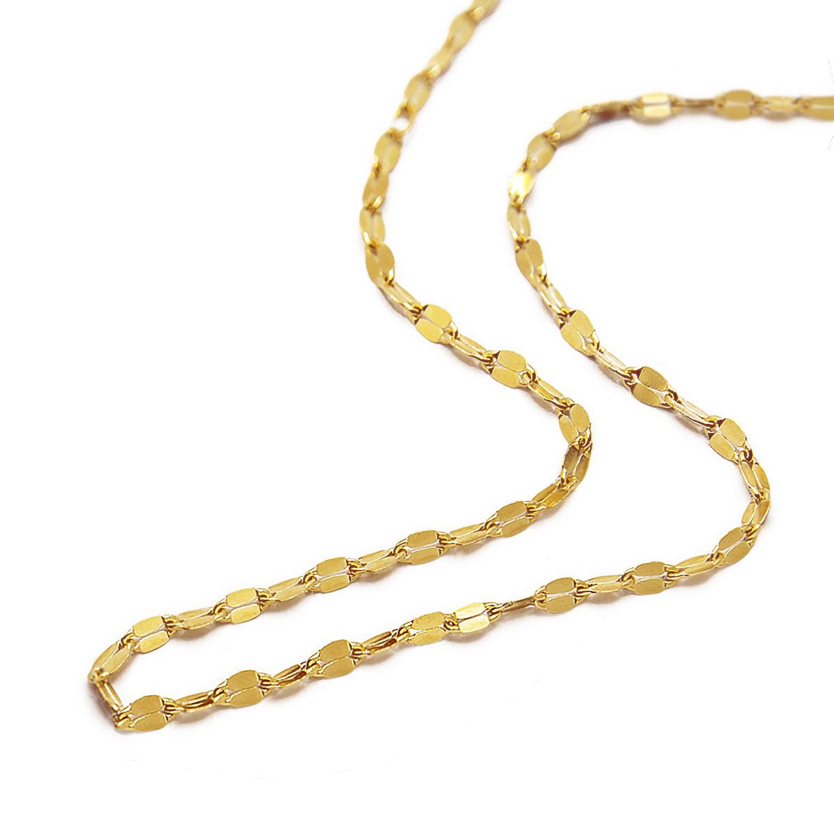Gold vermeil flat mirrored-link chain necklace coiled on a white background