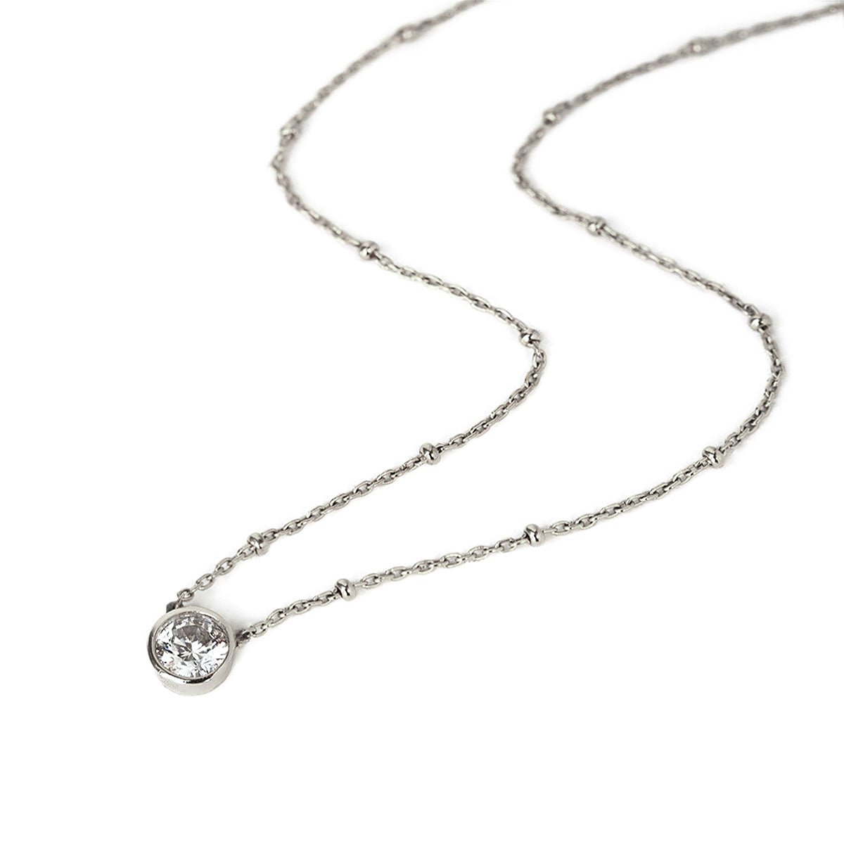 Sterling silver layered choker with a round clear stone on a beaded chain, close-up detail on a white background