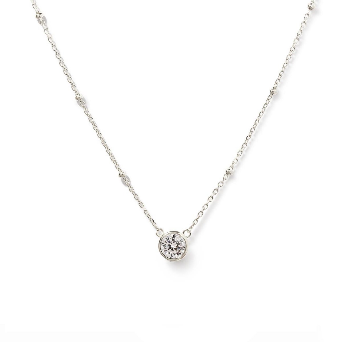 Sterling silver pendant necklace with a round clear stone on a beaded chain, on a white background