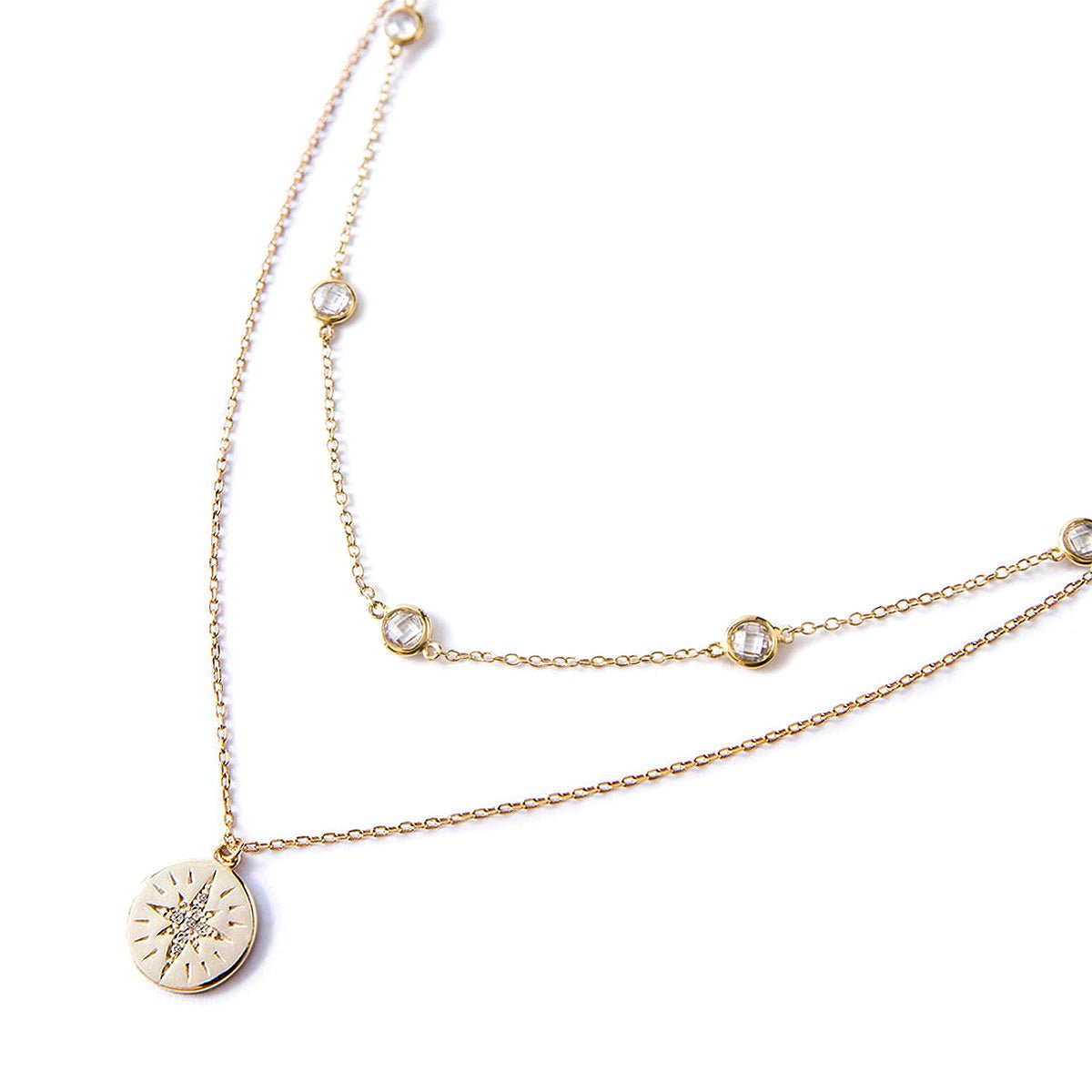 Gold vermeil layered station chain and star disc pendant with white zirconia, on a white background