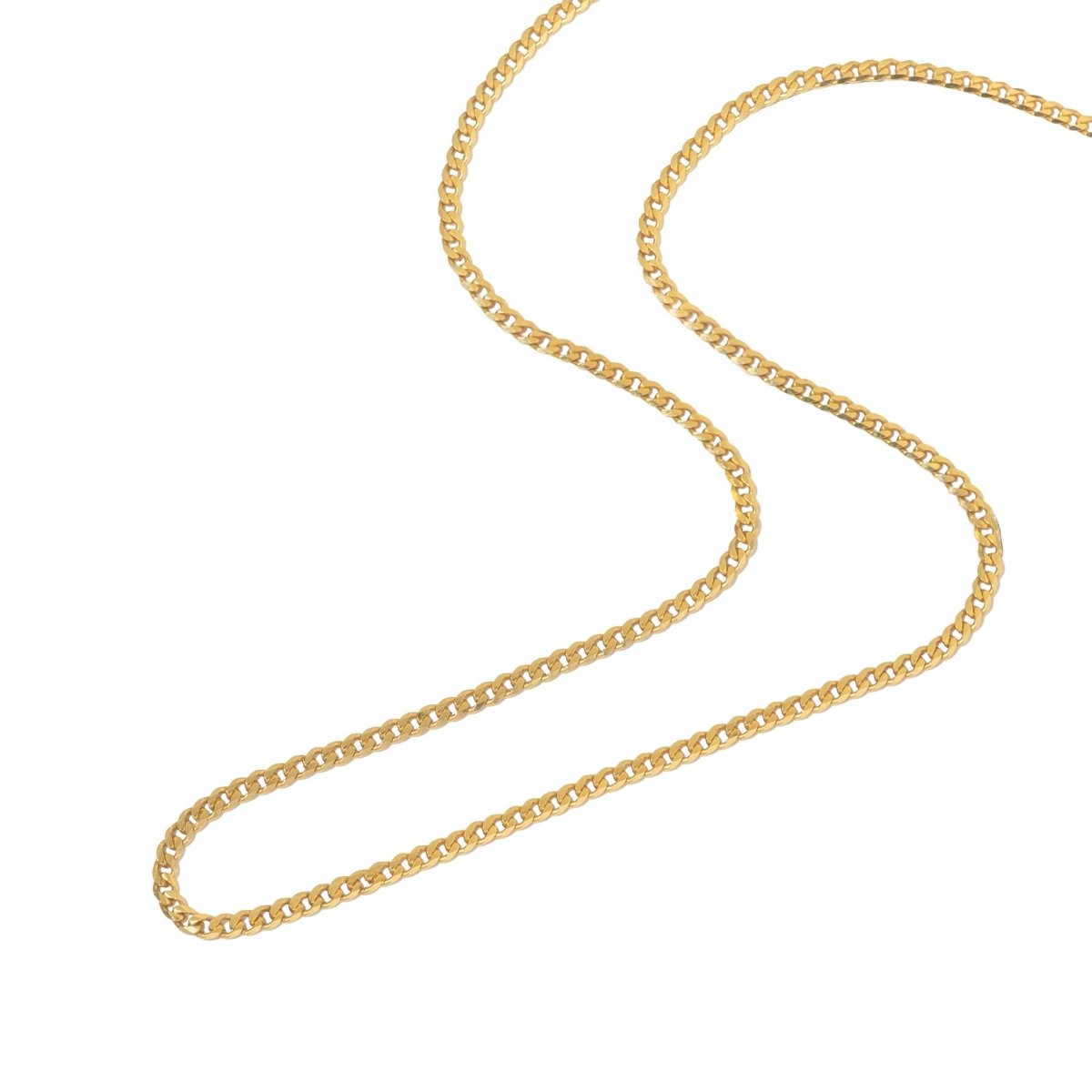 Gold vermeil flat Cuban curb chain necklace layered with two finer chains, shown on a model's neckline