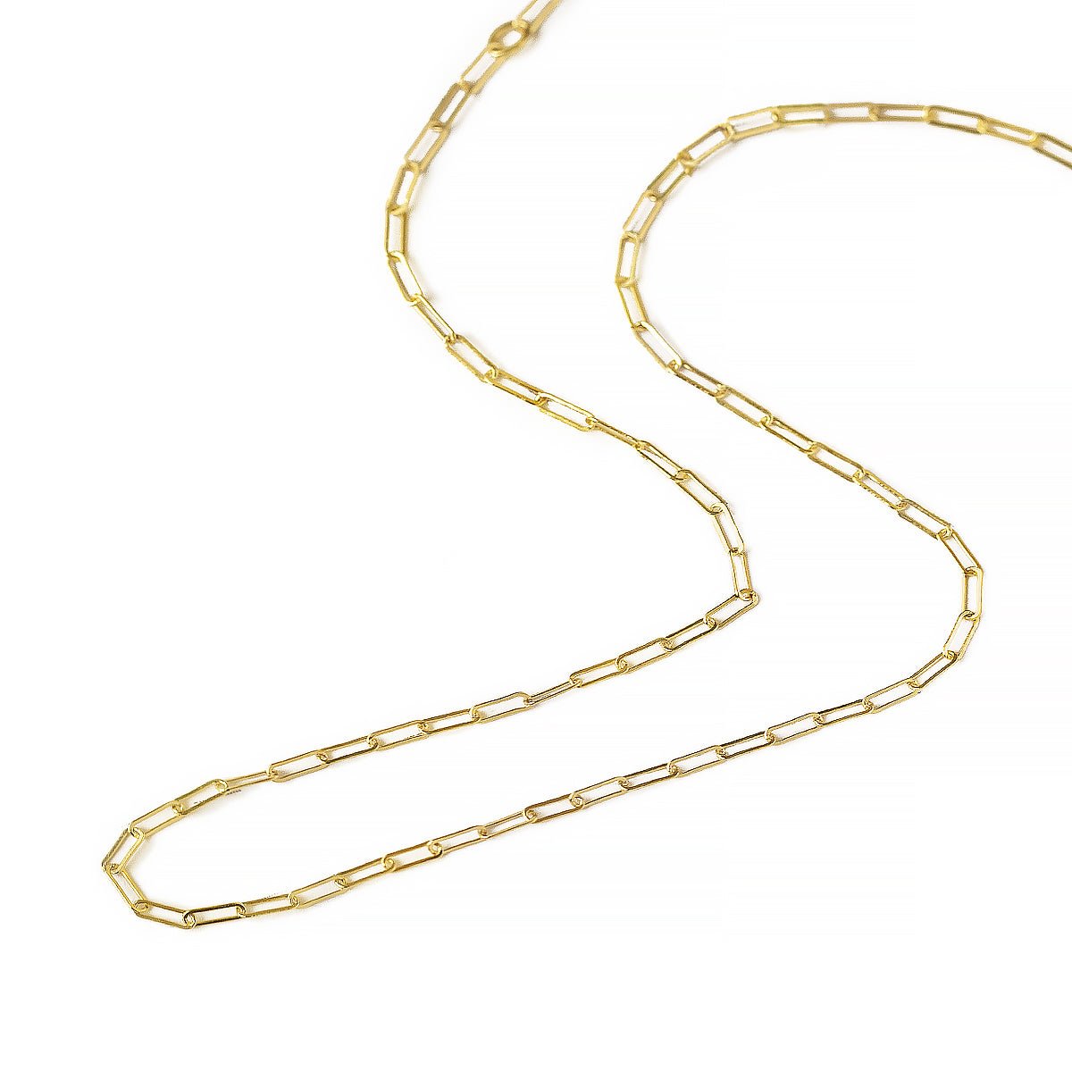 Gold-filled paperclip chain necklace coiled on a white background, full chain shown