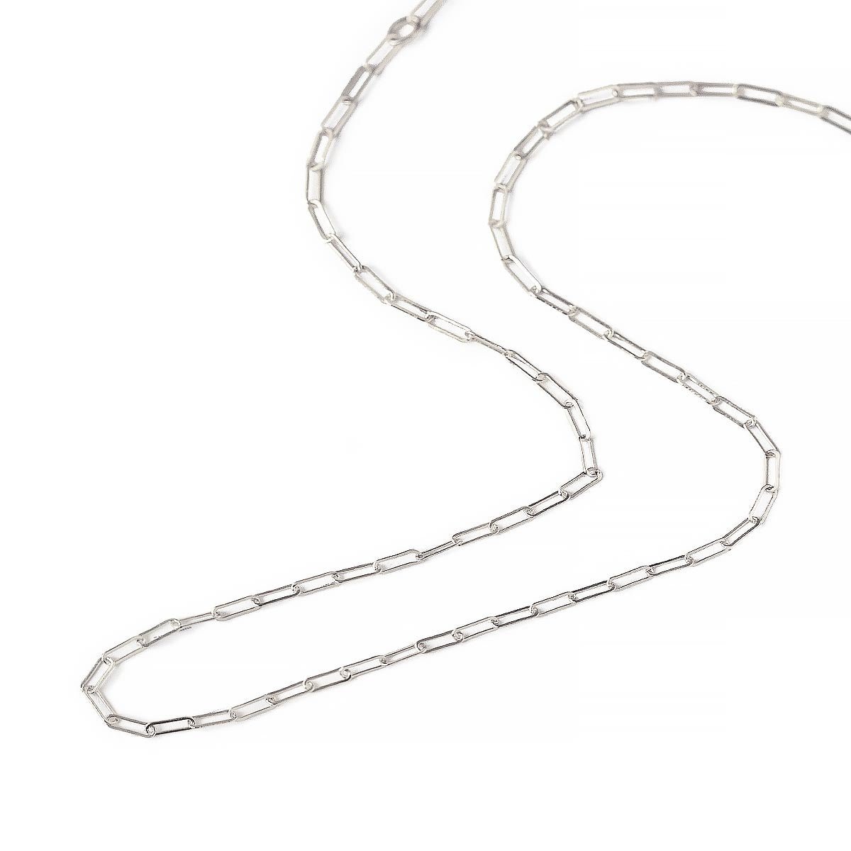 Sterling silver paperclip chain necklace coiled on a white background, full chain shown