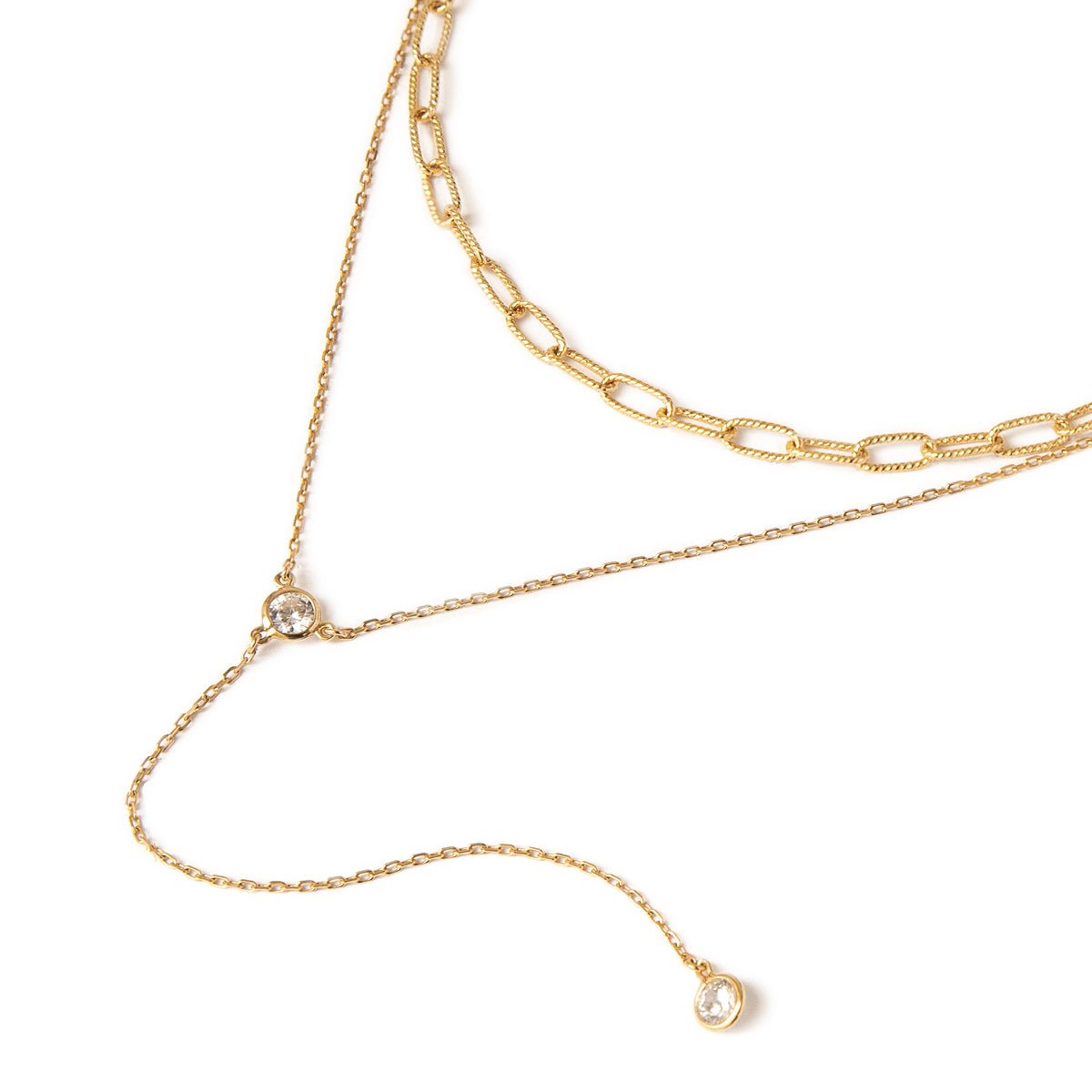 Gold vermeil lariat chain duo with bezel-set clear crystals, on a white background