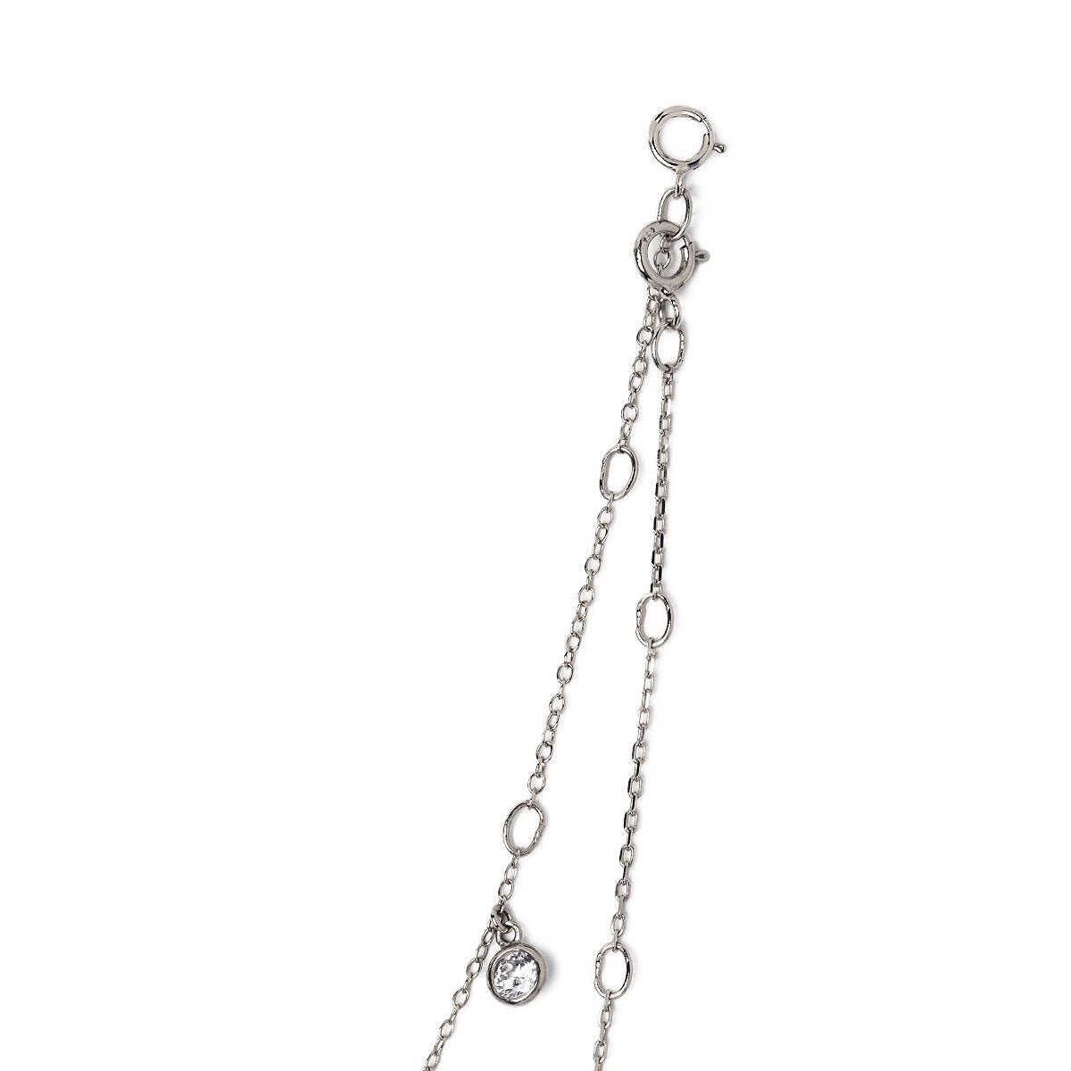 Sterling silver choker chain with a clear bezel drop and spring-ring clasp, close-up on a white background