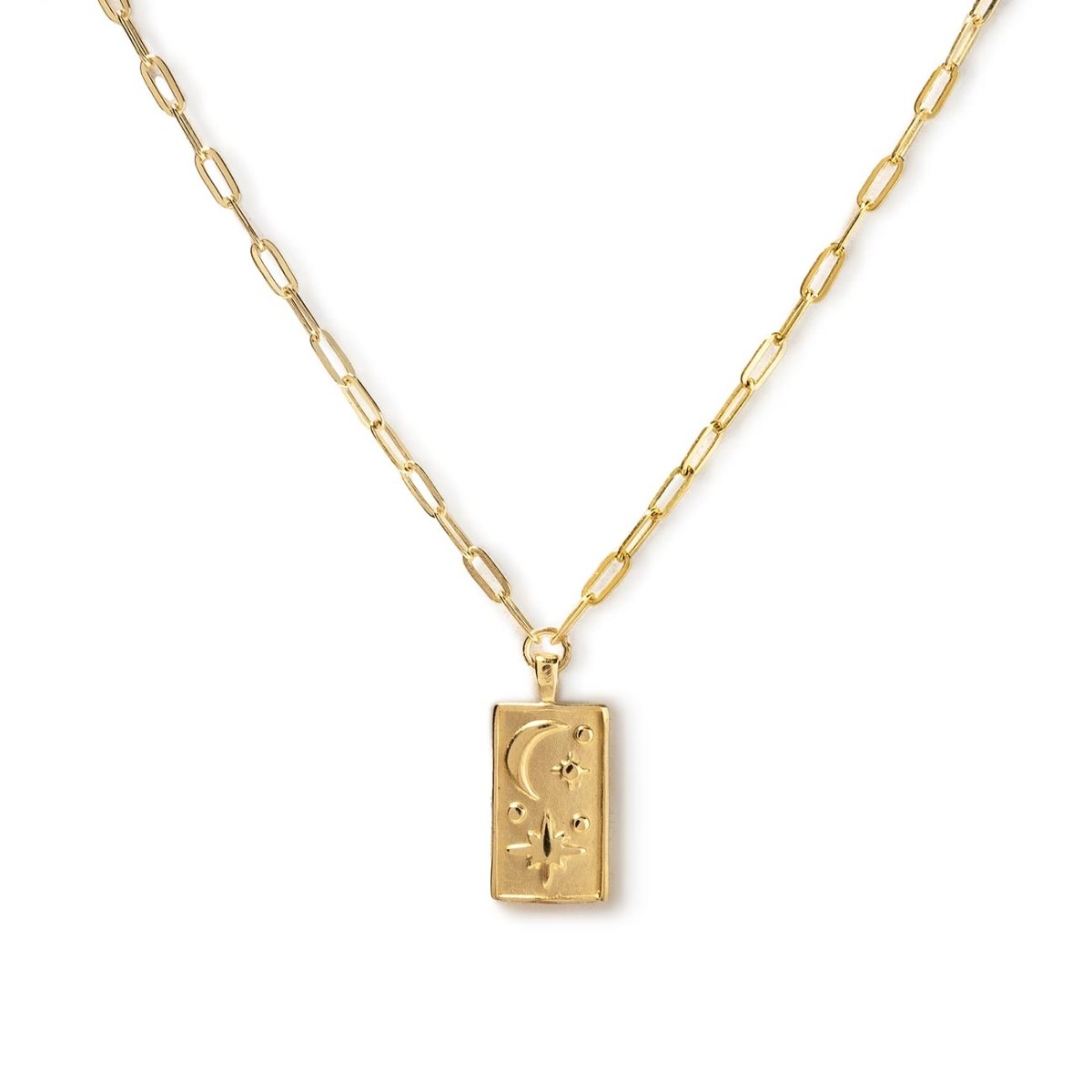 Gold vermeil rectangle pendant necklace with moon and star motif on a paperclip chain, on a white background