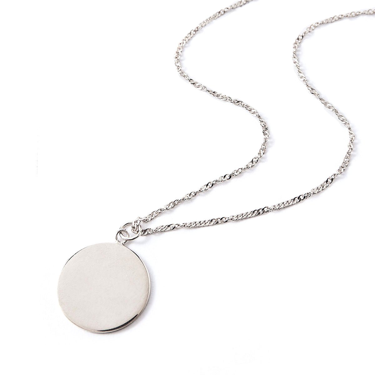 Sterling silver round disc pendant on a twisted chain, laid on a white background