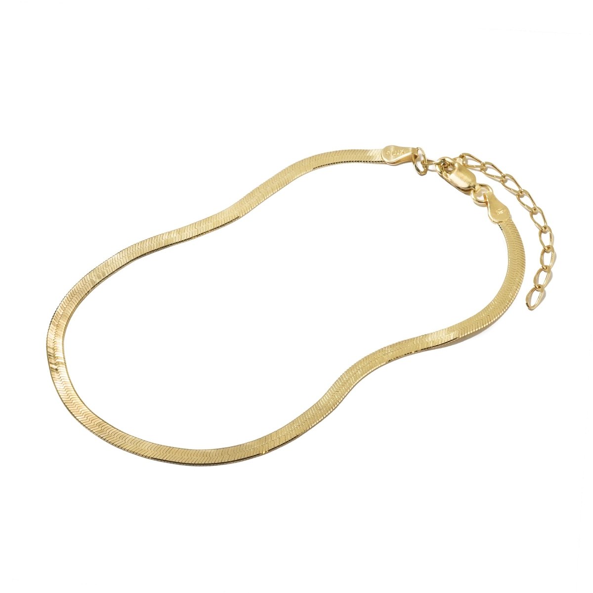 Gold vermeil flat herringbone chain anklet with a lobster clasp and extender, on a white background