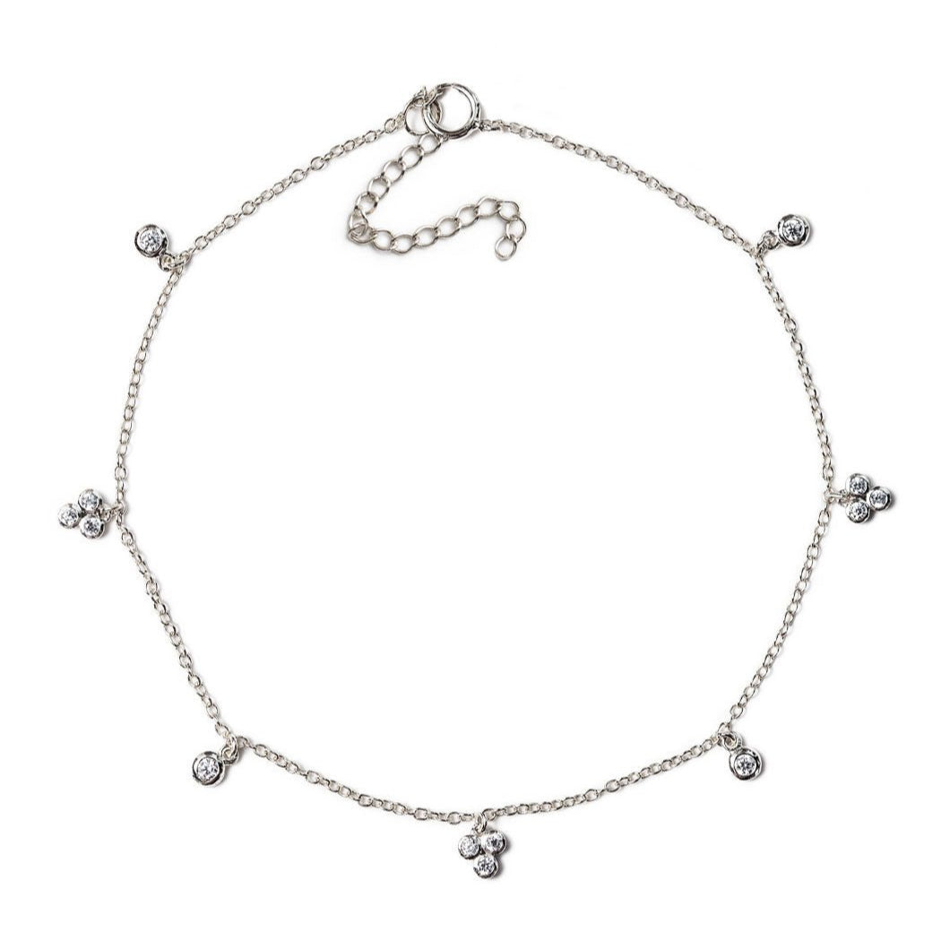 Sterling silver clover crystal anklet with clear stone stations, on a white background