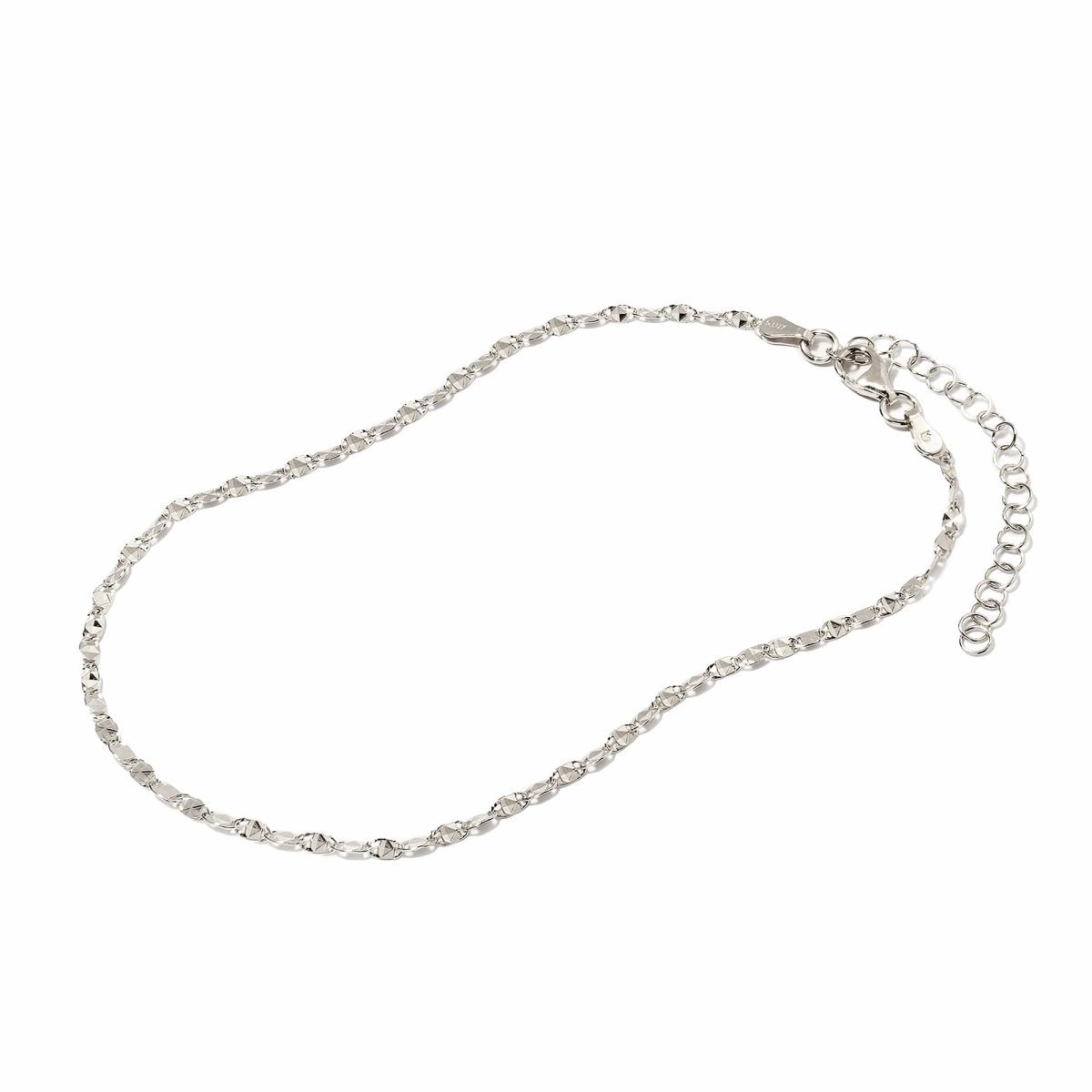Sterling silver diamond-cut chain anklet with a lobster clasp and extender, on a white background