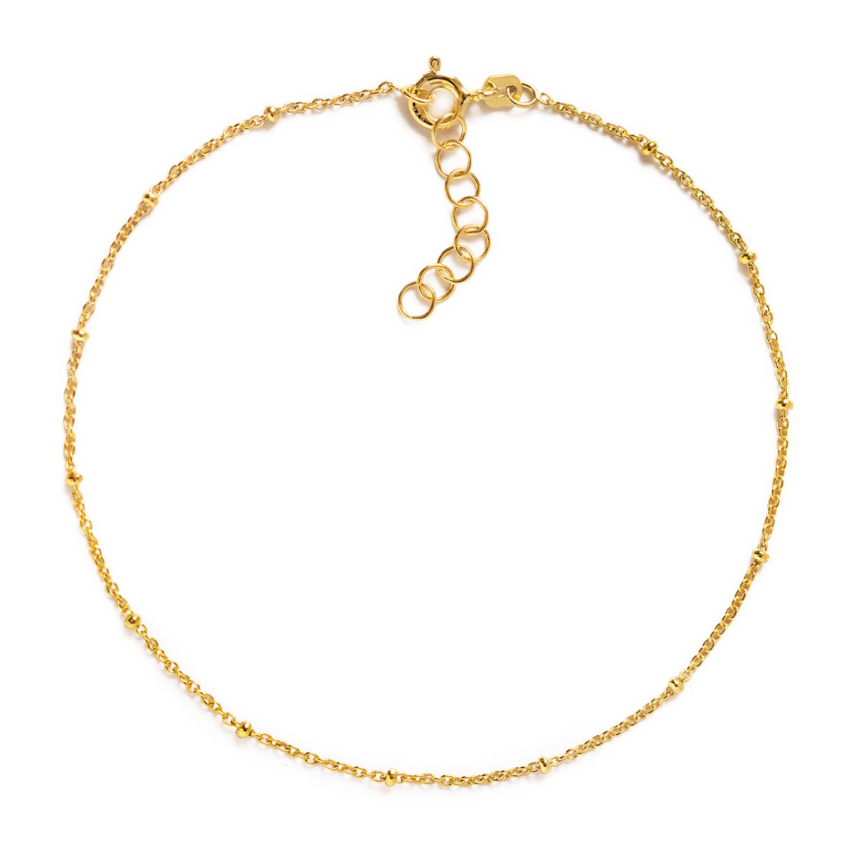 Gold vermeil beaded chain anklet with a spring-ring clasp and extender, laid on a white background