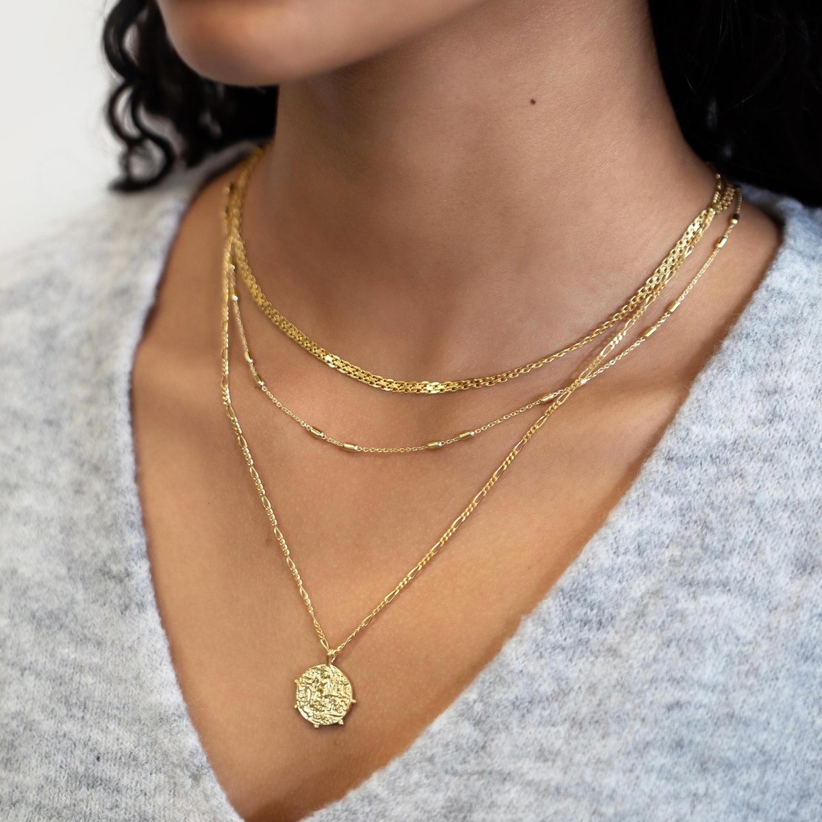 Gold vermeil layered chain choker with two slim strands, shown low on a model's neckline