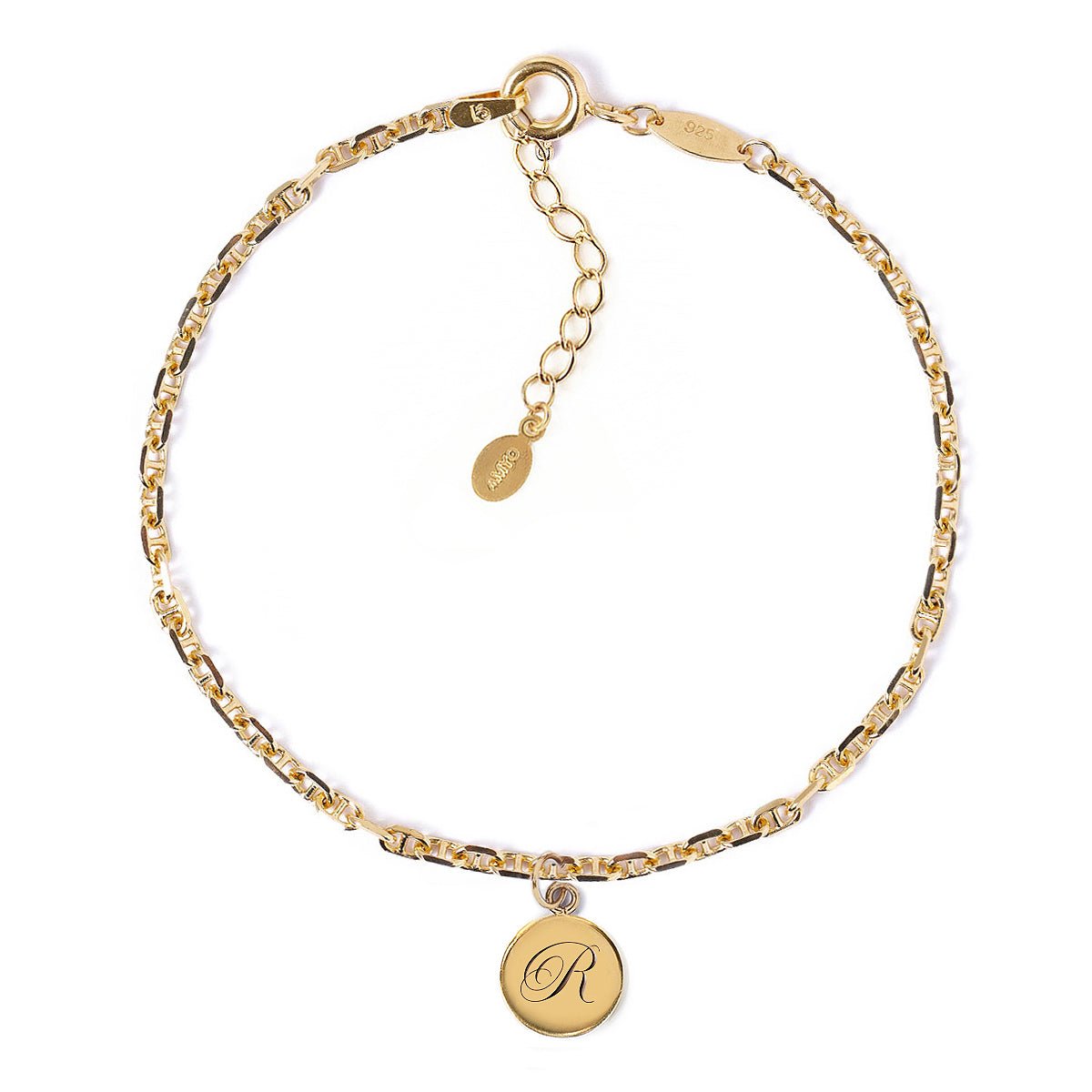 Gold Marina chain bracelet with an engraved round initial charm, on a white background