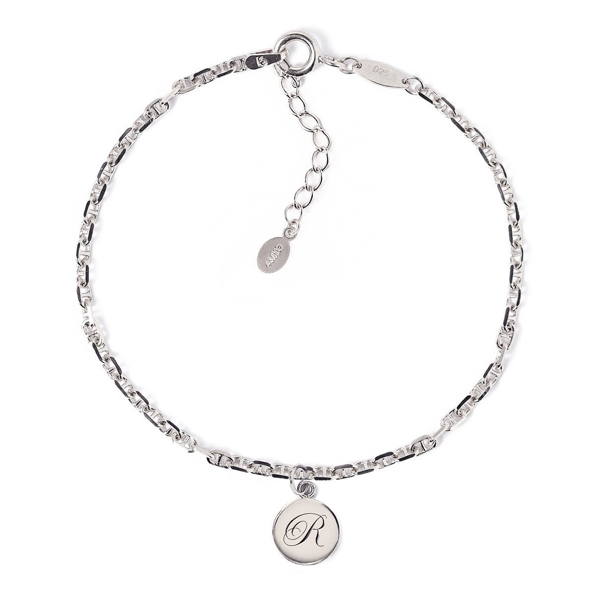 Silver Marina chain bracelet with an engraved round initial charm, on a white background