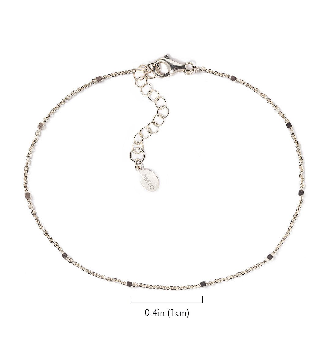 Sterling silver dainty satellite bead bracelet with size comparison, 0.4in shown, on a white background