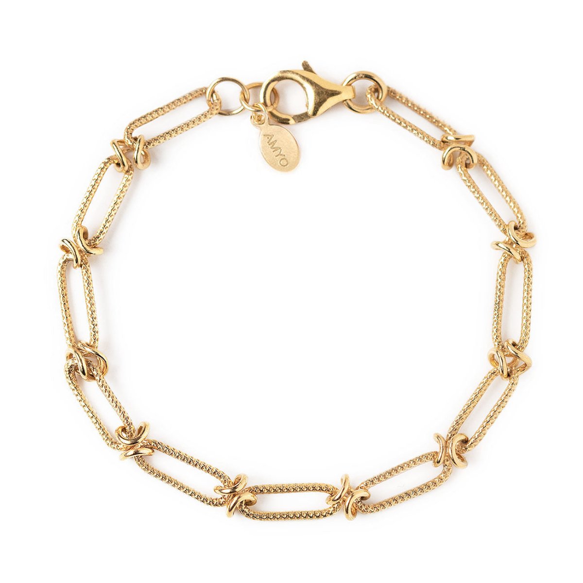 Gold vermeil chain link bracelet with knotted accents and a lobster clasp, on a white background
