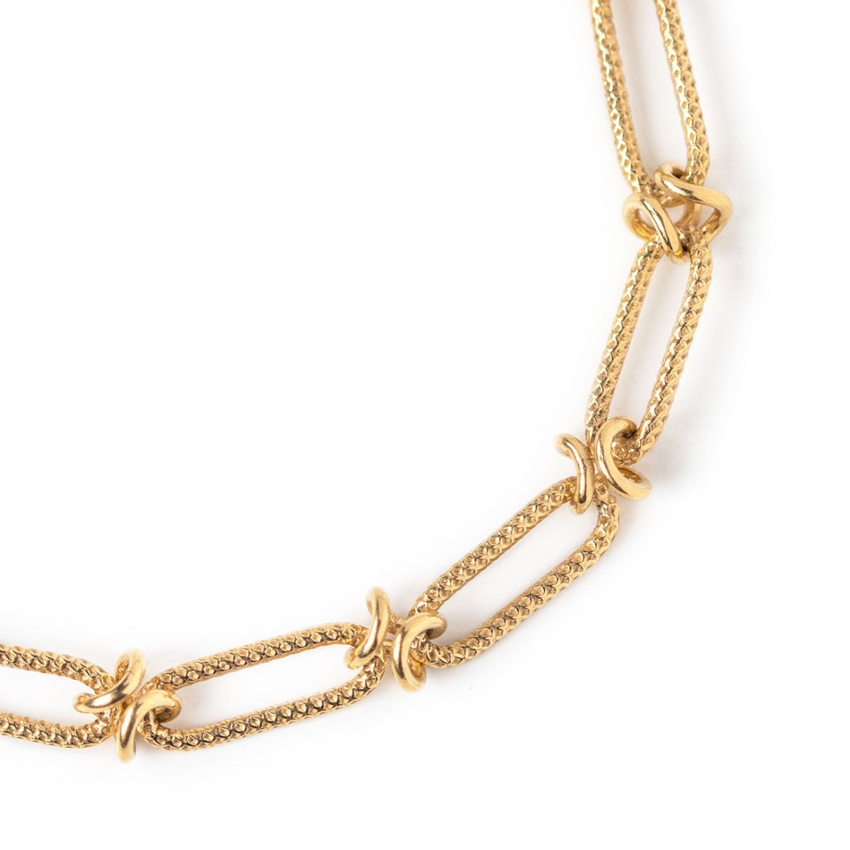 Gold vermeil chain link bracelet, close-up detail of textured links and knots