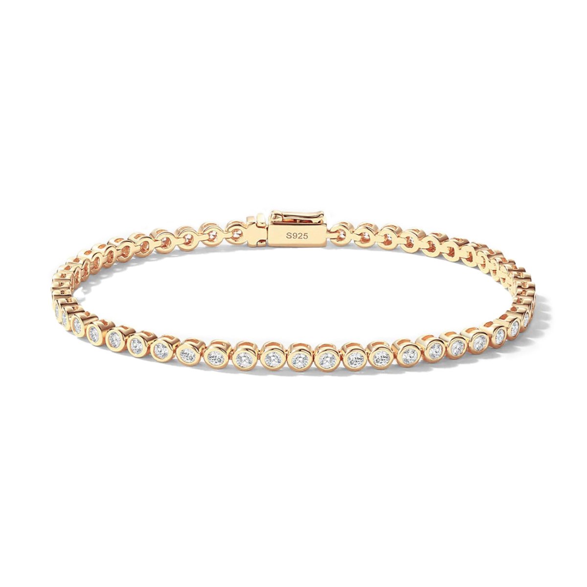 Gold vermeil bezel tennis bracelet with round clear stones and a box clasp, on a white background