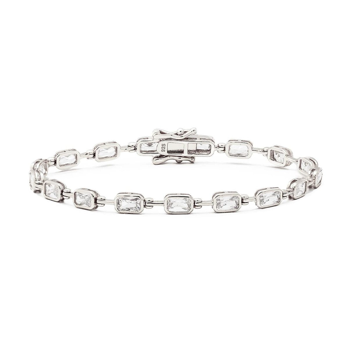 Sterling silver tennis bracelet with bezel-set rectangular white zirconia stones and box clasp, on a white background