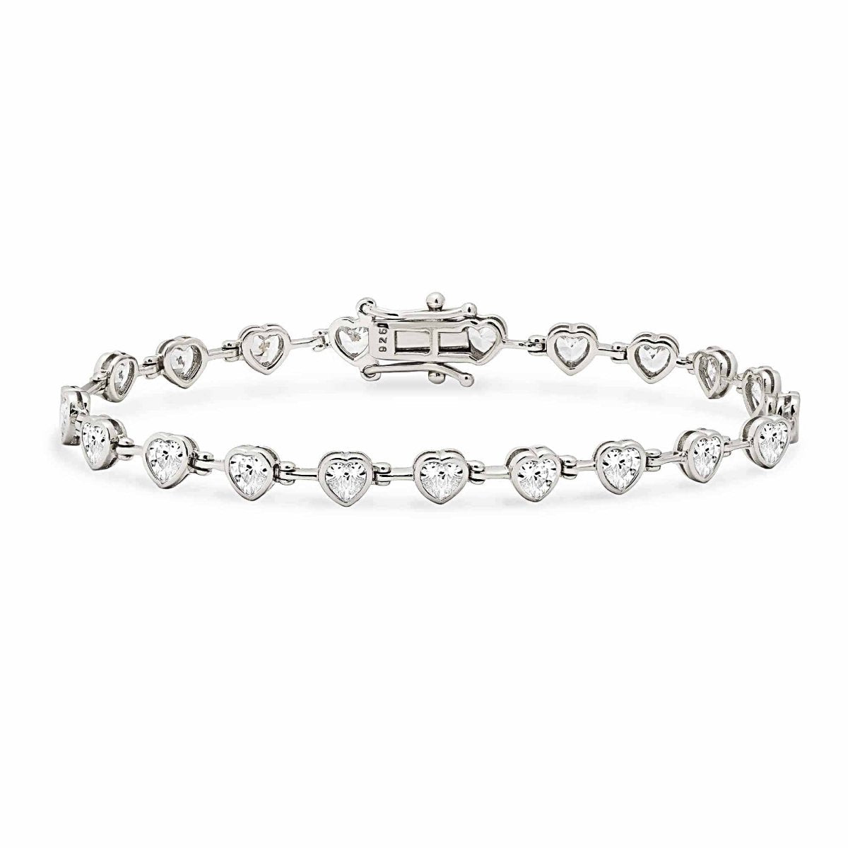 Sterling silver tennis bracelet with bezel-set heart-shaped clear stones, on a white background