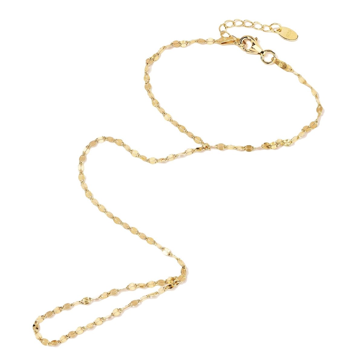 Gold vermeil faceted hand chain with delicate flat links, on a white background