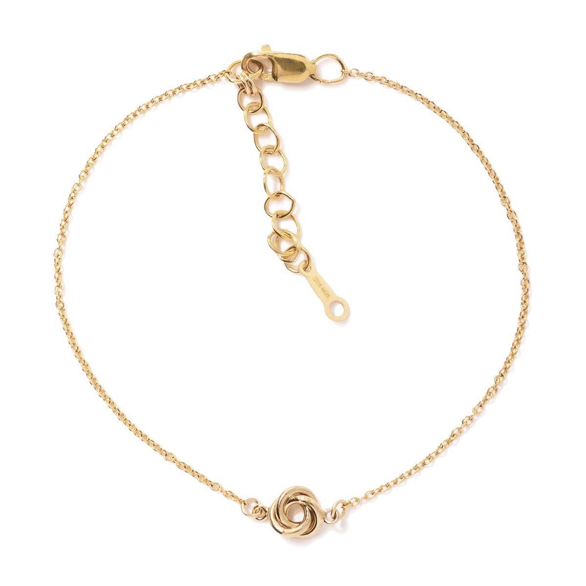 Gold-filled love knot chain bracelet with a lobster clasp, laid out on a white background