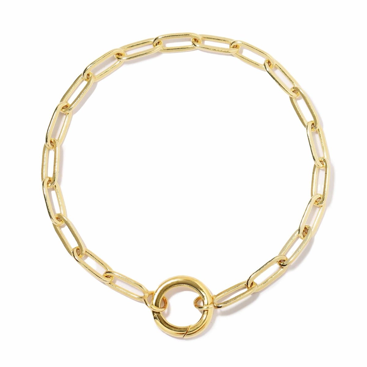 Gold vermeil paperclip chain charm bracelet with a clasp ring, pave leaf and disc charms, on a white background