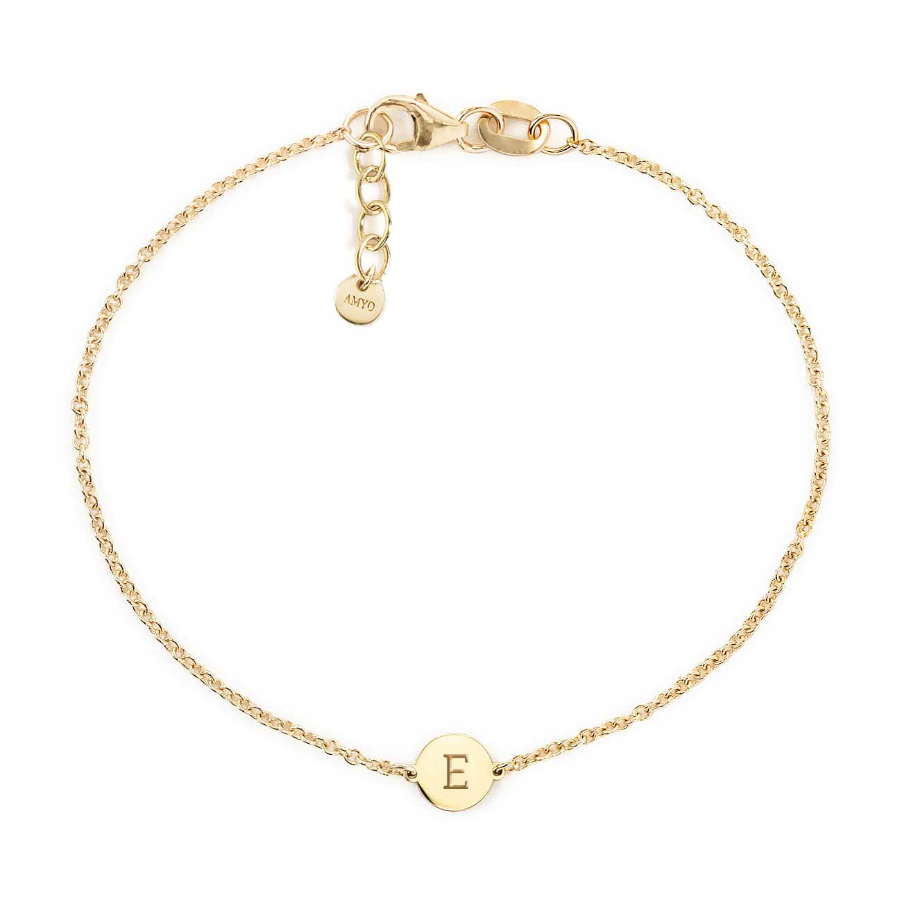 14K gold thin chain bracelet with a small disc engraved with an initial, on a white background