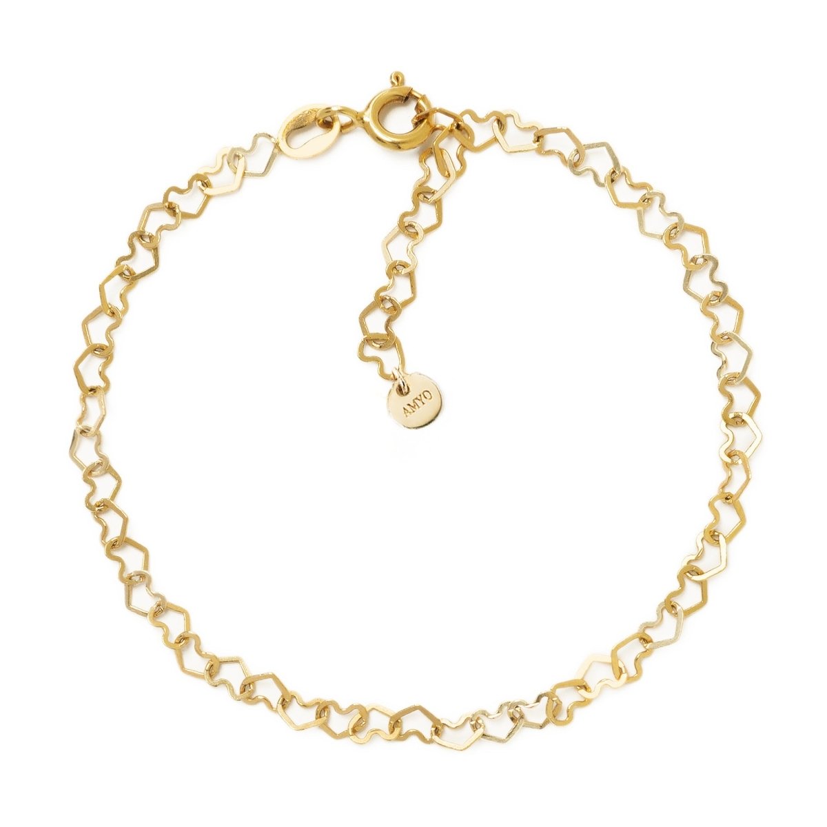 Gold-filled open heart-link chain bracelet with a spring-ring clasp and round tag, on a white background