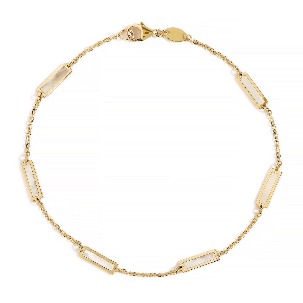 14K gold mother of pearl bar bracelet styled in a wooden bowl with matching layering chains