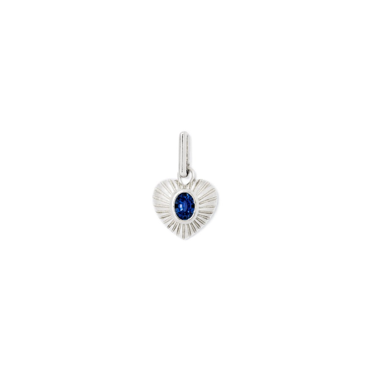 Sterling silver ridged heart charm with an oval blue sapphire center, on a white background
