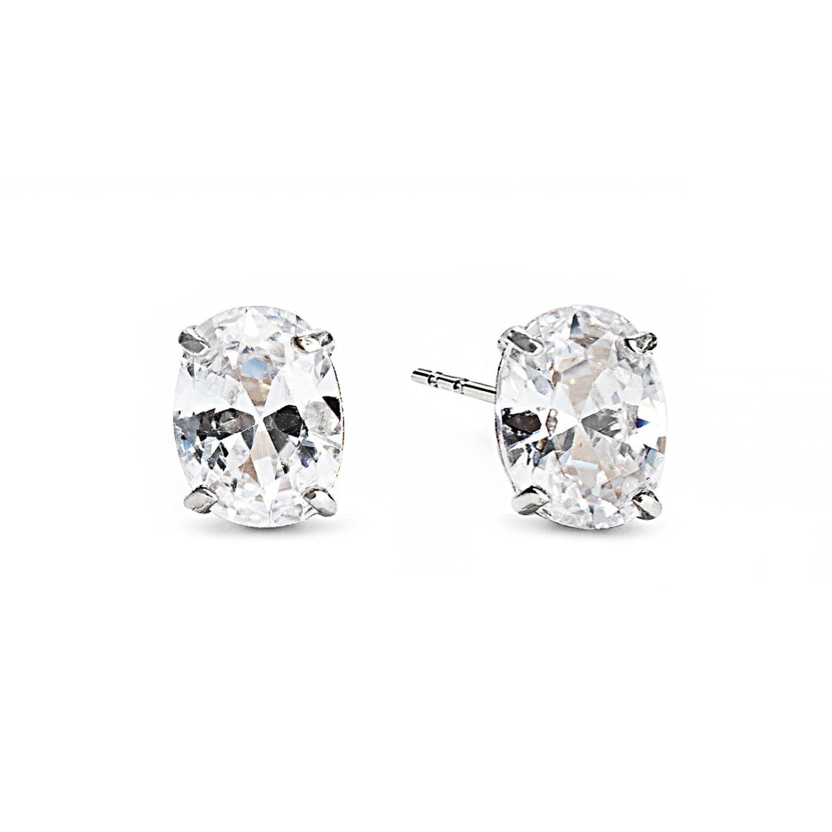 Sterling silver oval zirconia stud earrings with clear prong-set stones, on a white background