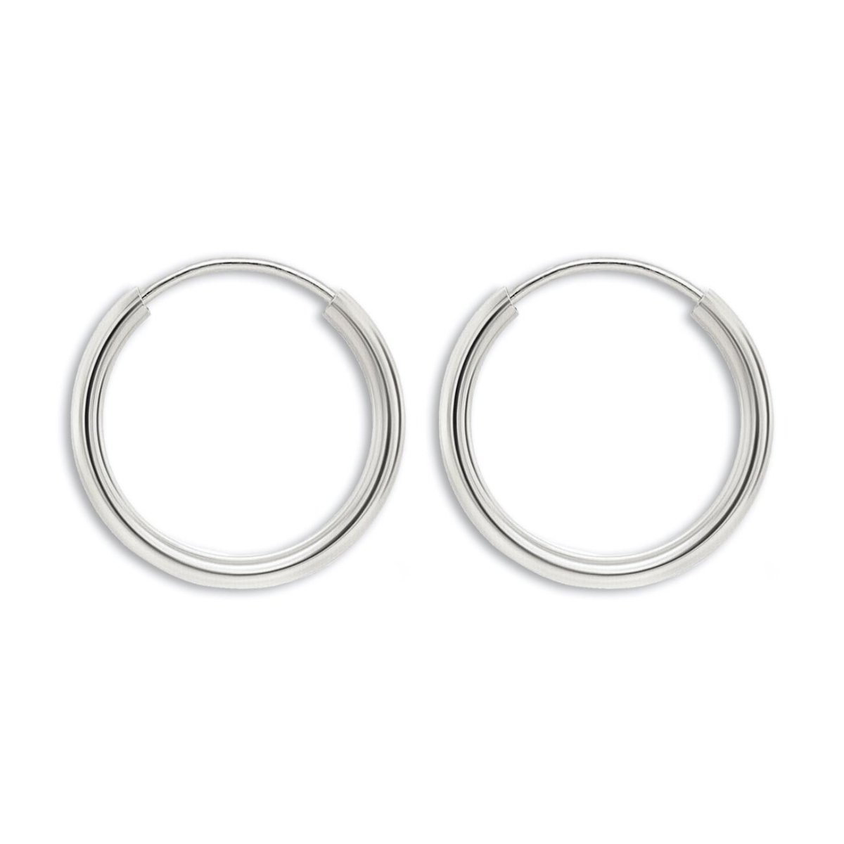 Sterling silver thin endless huggie hoops, one pair, on a white background