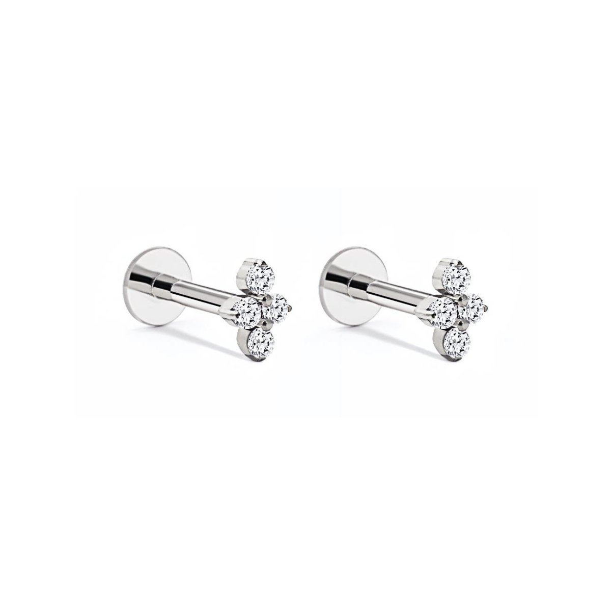 Pair of titanium trinity flat back studs with three clear stones, on a white background