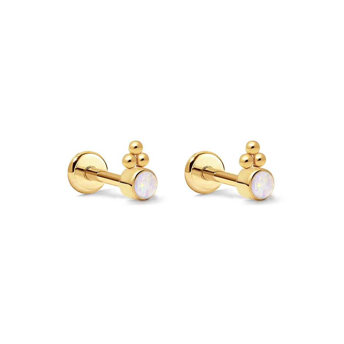 Pair of gold titanium flat back studs with a white opal and bead trio, on a white background