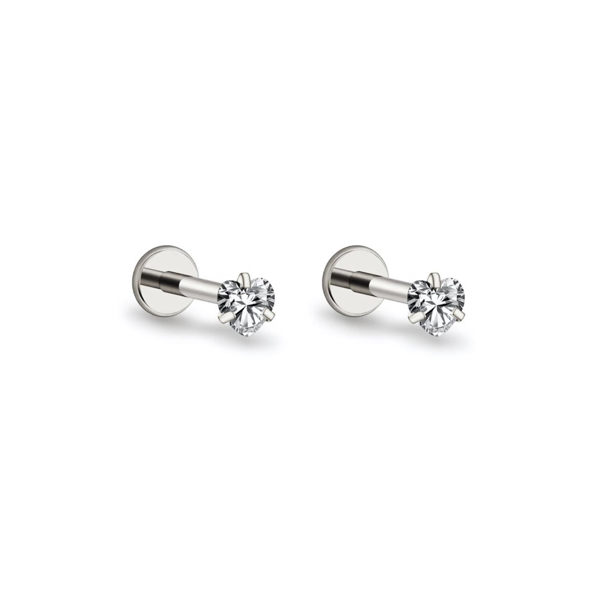 Pair of titanium heart flat back studs with clear stones, on a white background