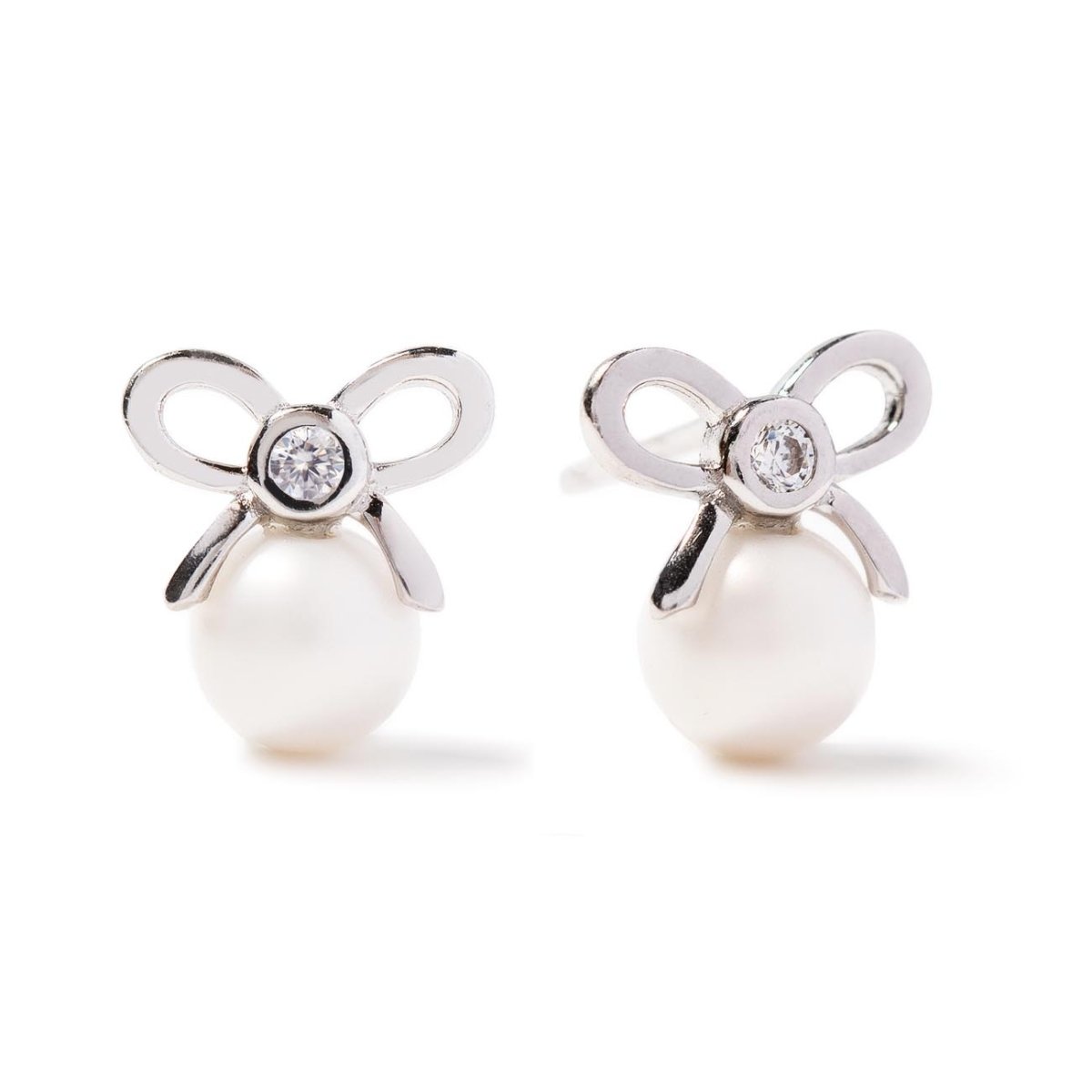Pair of sterling silver bow stud earrings with a clear stone and a pearl drop, on a white background