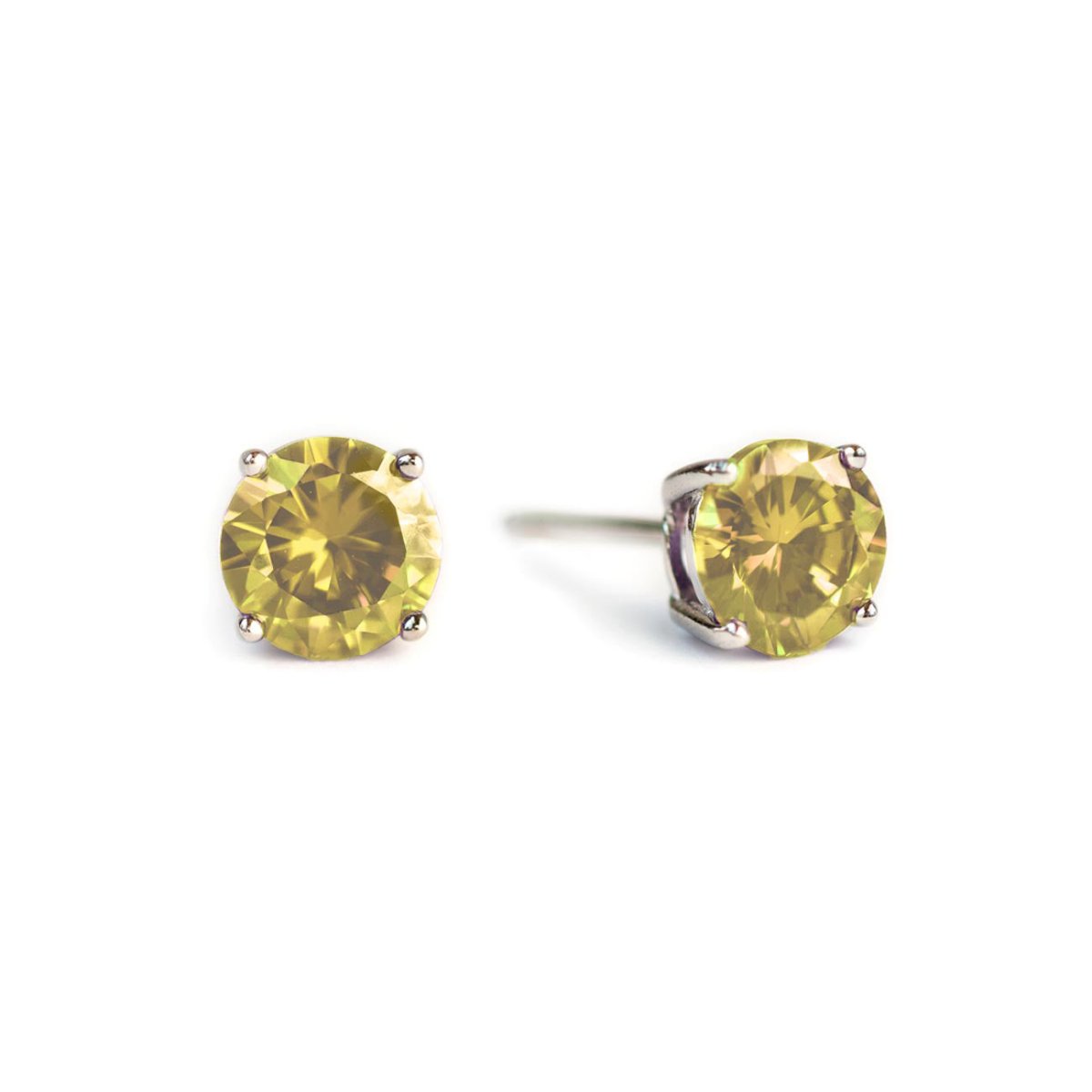 Pair of sterling silver citrine studs with round yellow stones, on a white background