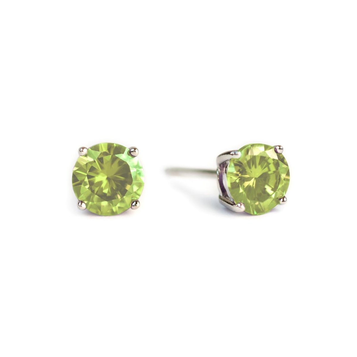 Pair of sterling silver peridot studs with round green stones, on a white background