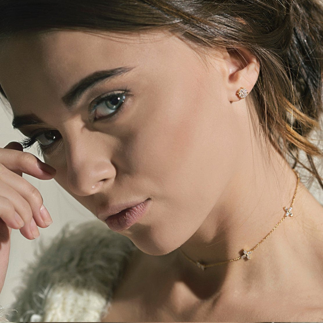 Gold vermeil clear crystal flower choker shown on a model with a matching cluster stud earring