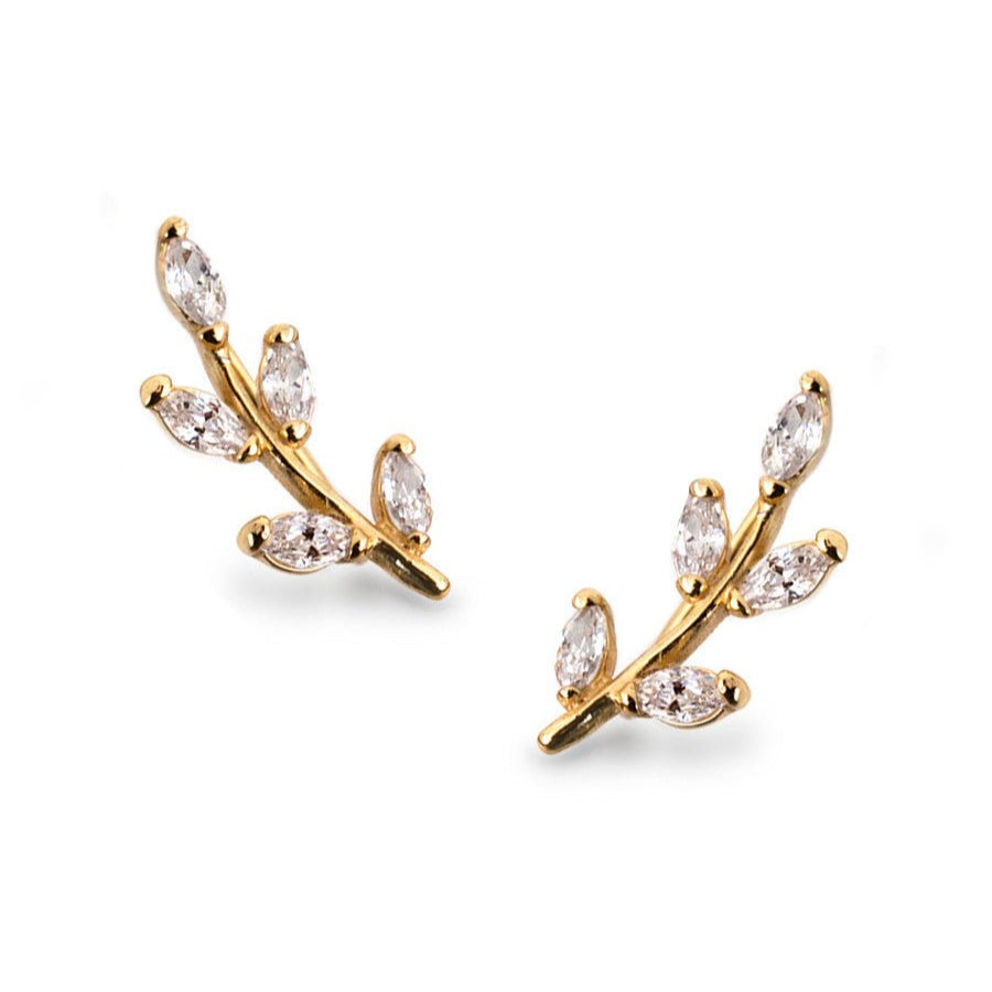 Pair of gold vermeil ear climbers shaped like leafy vines set with marquise zirconia, on a white background